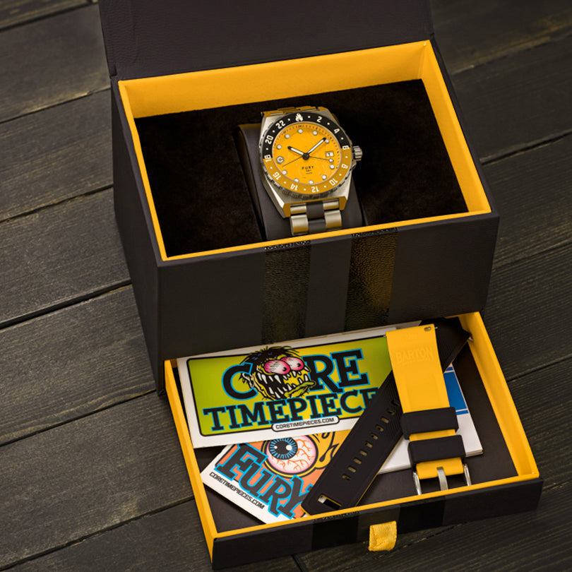 yellow dial watch in packaging